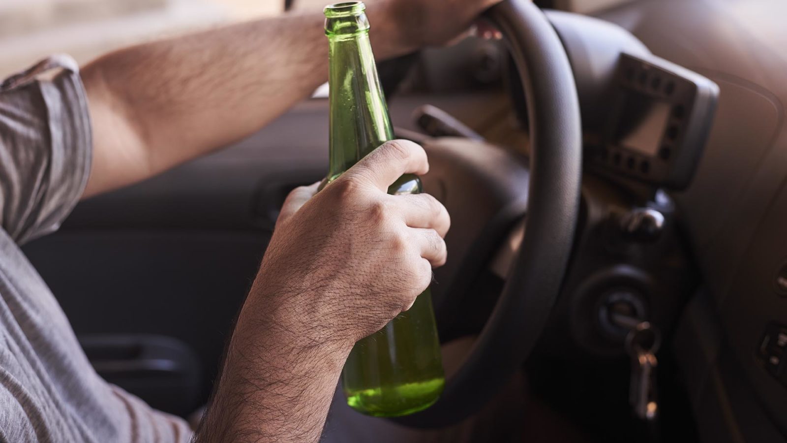 holding a beer while driving