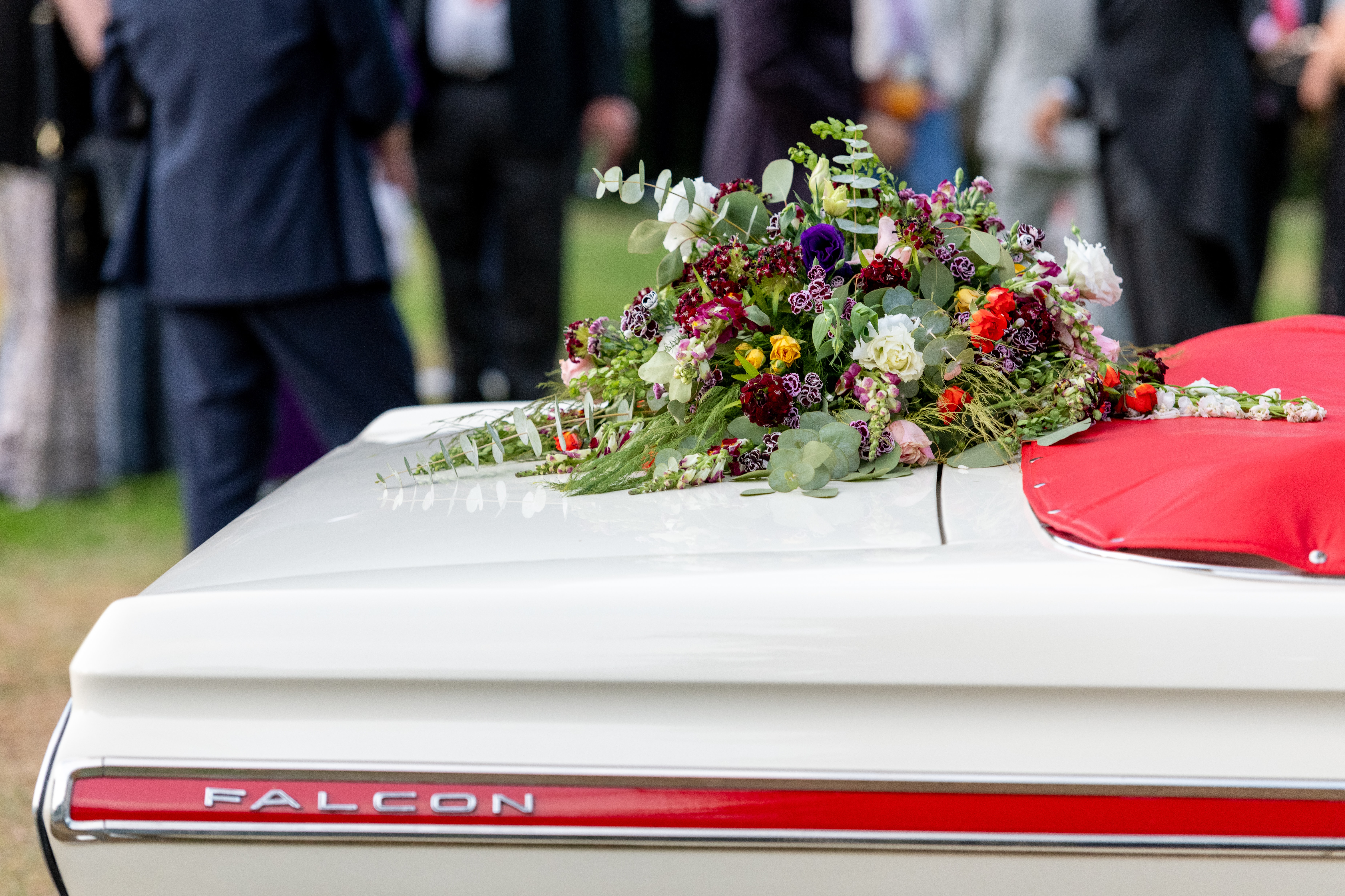 coffin with flowers