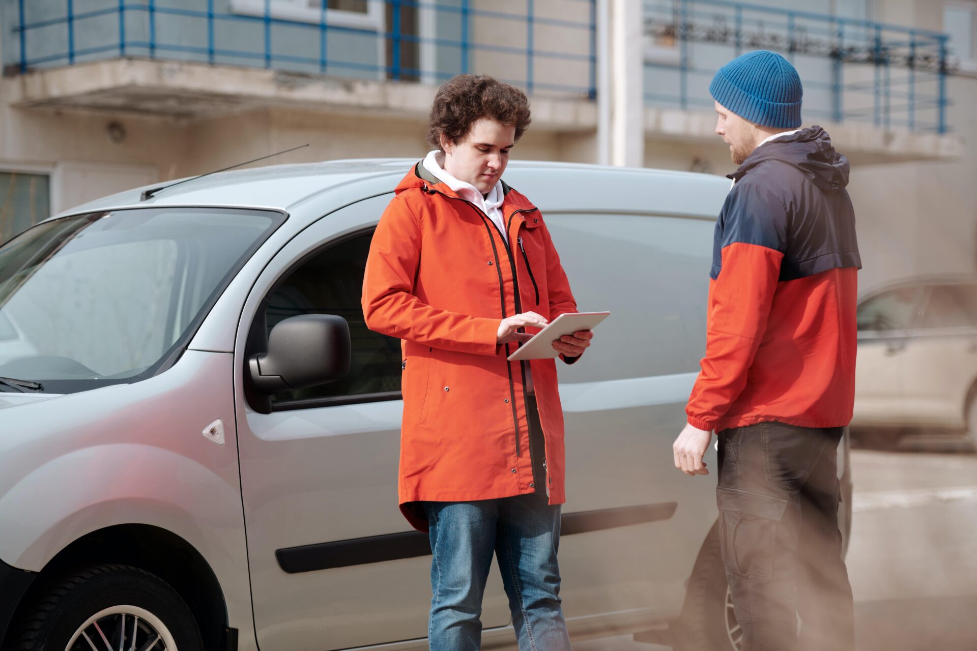Delivery person exchanging information with a person