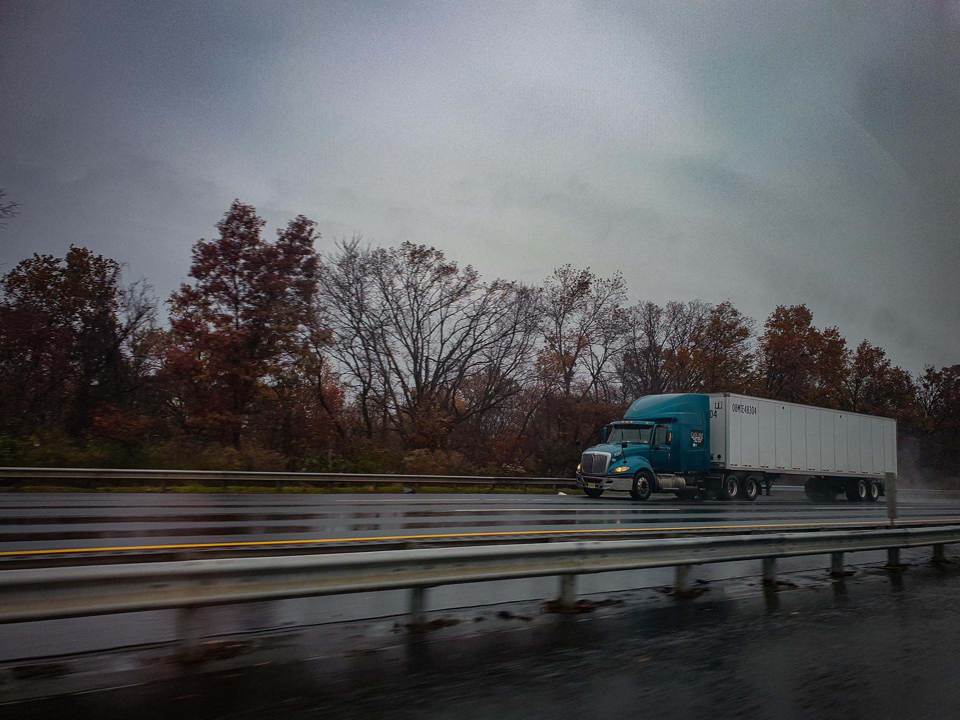 truck driving on gloomy highway